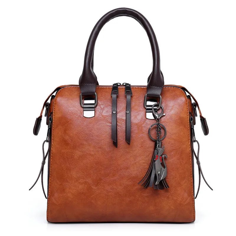 kit-premium-em-couro-genuino-bolsa-carteira-carteira-de-mao-necessaire-de-brinde-1304737 - Kabani