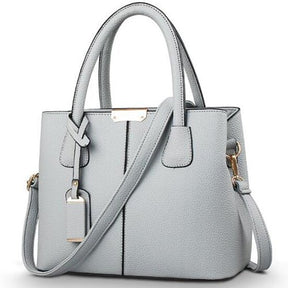 bolsa-feminina-em-couro-genuino-emma-ferraz-5953445 - Kabani