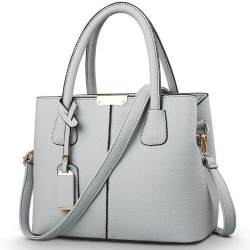 bolsa-feminina-em-couro-genuino-emma-ferraz-5953445 - Kabani