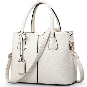 bolsa-feminina-em-couro-genuino-emma-ferraz-9645931 - Kabani