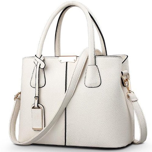 bolsa-feminina-em-couro-genuino-emma-ferraz-9645931 - Kabani