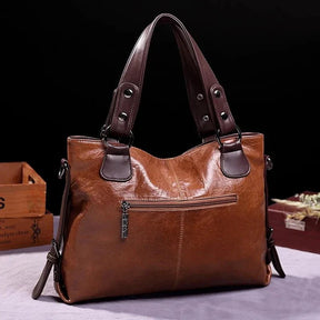 bolsa-feminina-em-couro-genuino-isis-gabrielli-1829269 - Kabani