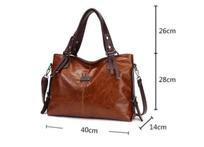 bolsa-feminina-em-couro-genuino-isis-gabrielli-2361698 - Kabani