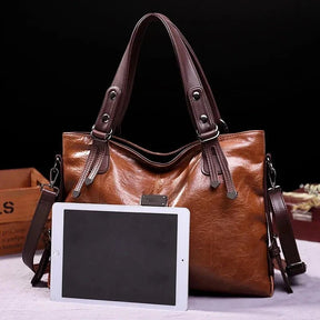bolsa-feminina-em-couro-genuino-isis-gabrielli-9078124 - Kabani