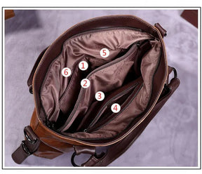 bolsa-feminina-em-couro-genuino-isis-gabrielli-9397454 - Kabani