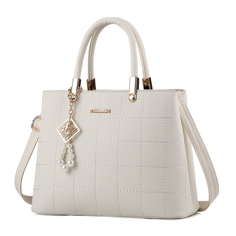 bolsa-feminina-em-couro-genuino-janevive-7410707 - Kabani