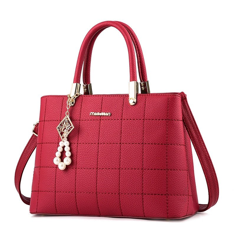 bolsa-feminina-em-couro-genuino-janevive-9742424 - Kabani