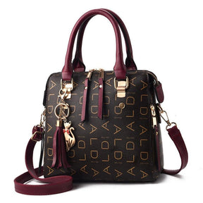 bolsa-feminina-em-couro-genuino-pure-luxury-by-lina-chaveiro-de-brinde-5758984 - Kabani