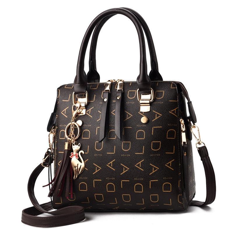 bolsa-feminina-em-couro-genuino-pure-luxury-by-lina-chaveiro-de-brinde-7788468 - Kabani