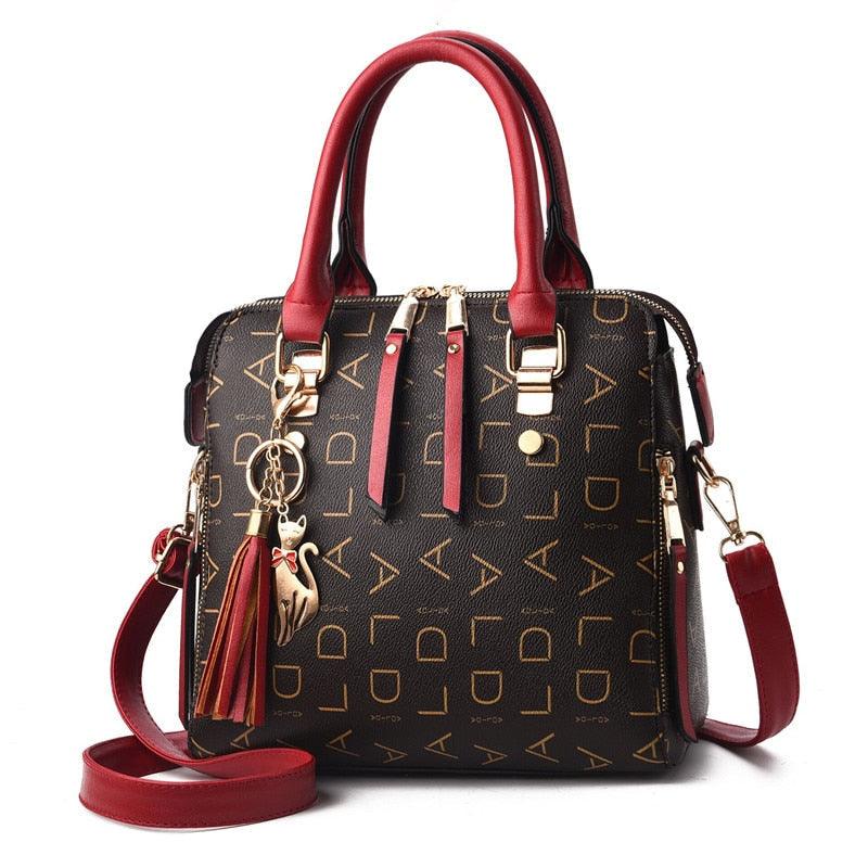 bolsa-feminina-em-couro-genuino-pure-luxury-by-lina-chaveiro-de-brinde-9194685 - Kabani