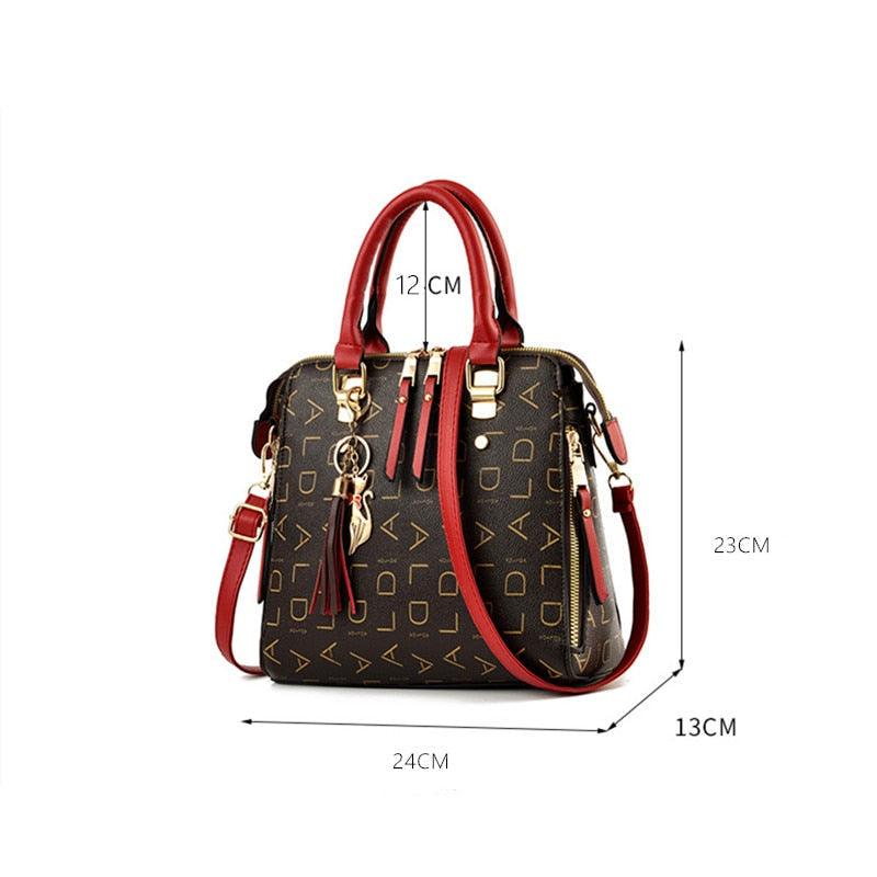 bolsa-feminina-em-couro-genuino-pure-luxury-by-lina-chaveiro-de-brinde-9850401 - Kabani