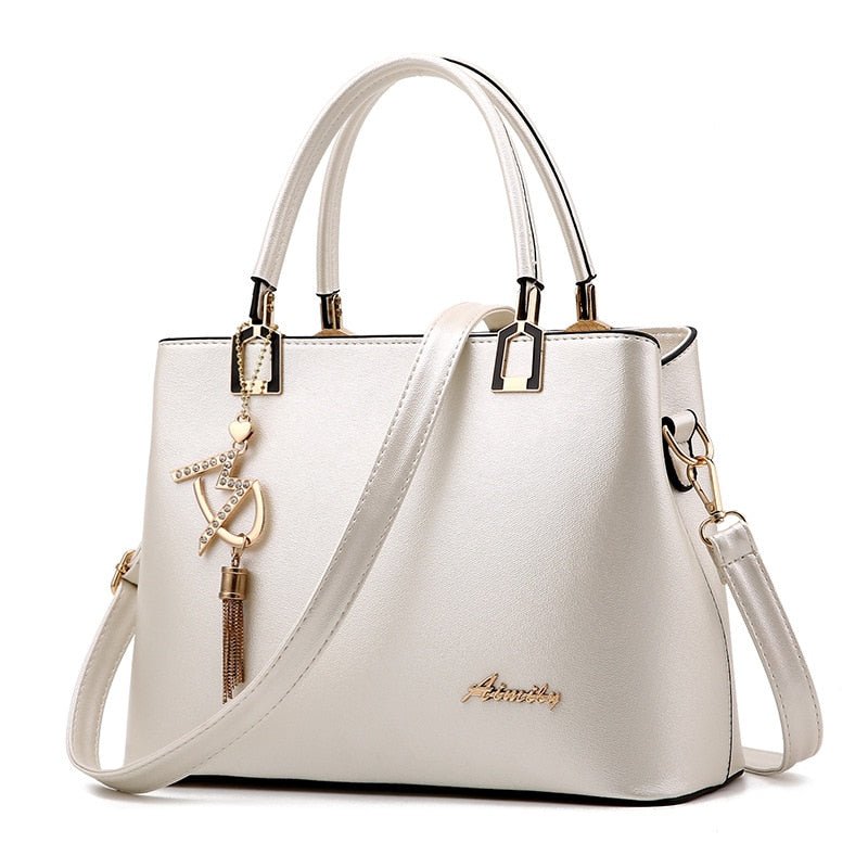 bolsa-feminina-em-couro-genuino-versatile-5010599 - Kabani