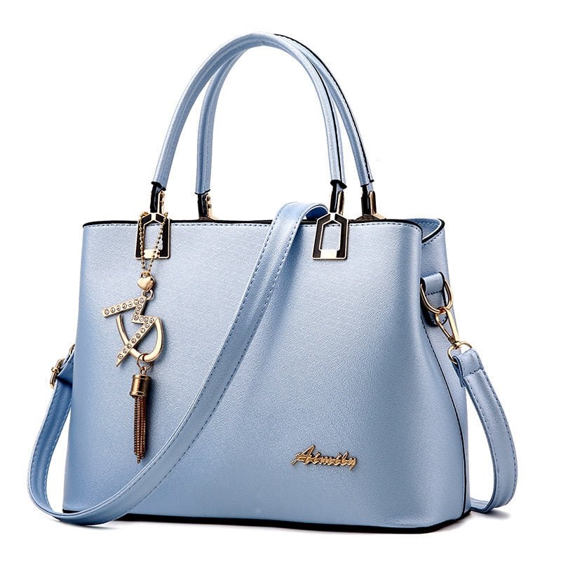 bolsa-feminina-em-couro-genuino-versatile-7025615 - Kabani