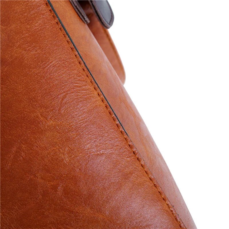 kit-premium-em-couro-genuino-bolsa-carteira-carteira-de-mao-necessaire-de-brinde-2453414 - Kabani
