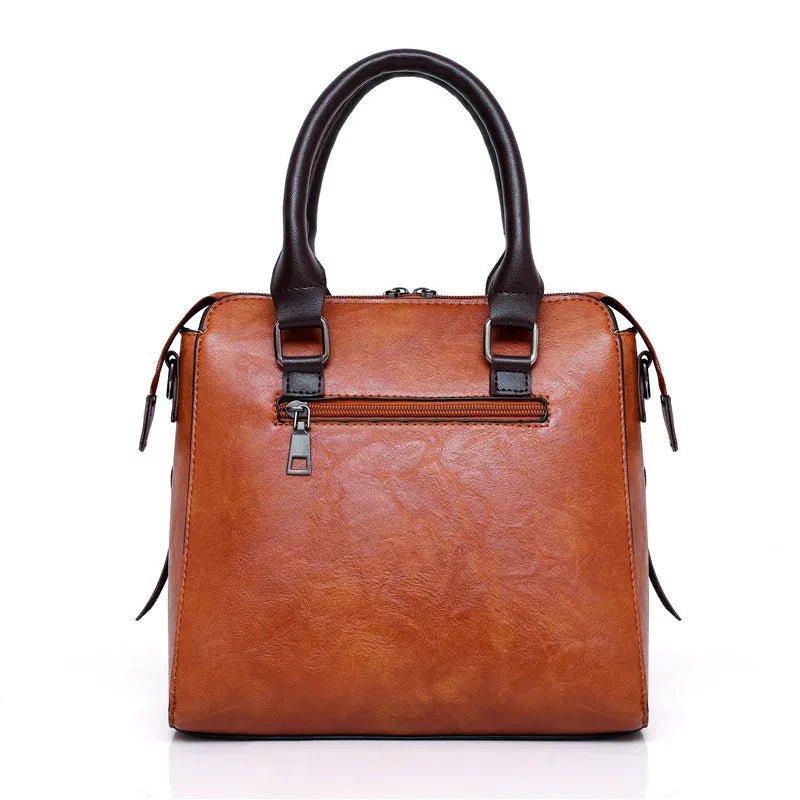 kit-premium-em-couro-genuino-bolsa-carteira-carteira-de-mao-necessaire-de-brinde-4411332 - Kabani