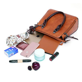 kit-premium-em-couro-genuino-bolsa-carteira-carteira-de-mao-necessaire-de-brinde-9087678 - Kabani